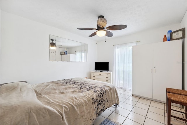 2013 Capri Rd, Valrico, FL 33594 - bedroom with light tile patterned floors and a ceiling fan