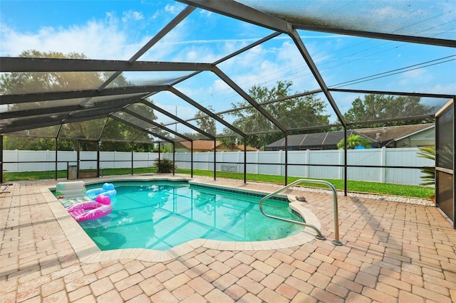 2013 Capri Rd, Valrico, FL 33594 - view of swimming pool with a fenced backyard, a patio, and glass enclosure