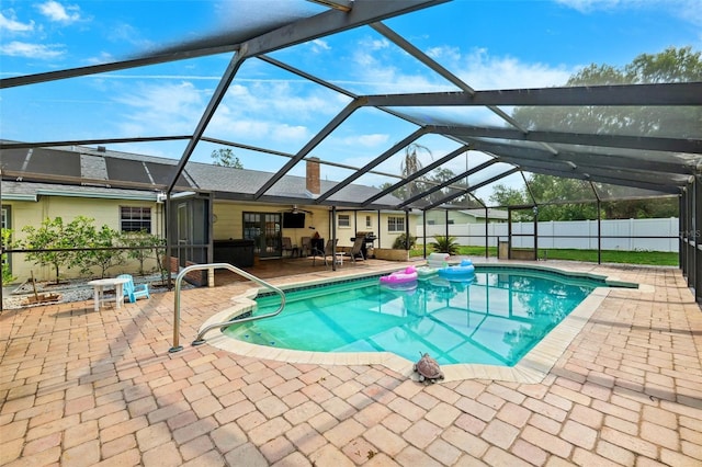 2013 Capri Rd, Valrico, FL 33594 - view of pool featuring a patio area, glass enclosure, and ceiling fan