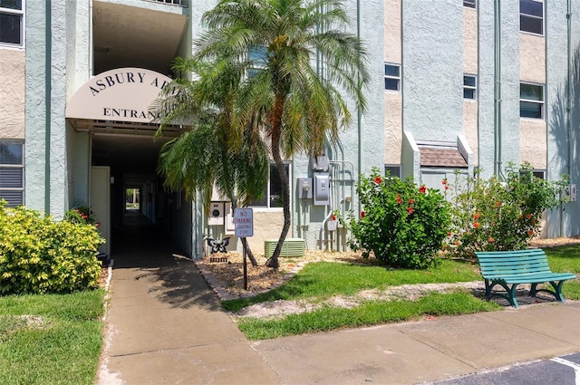 801 83rd Ave N Unit 209, Saint Petersburg, FL 33702 - doorway to property with stucco siding