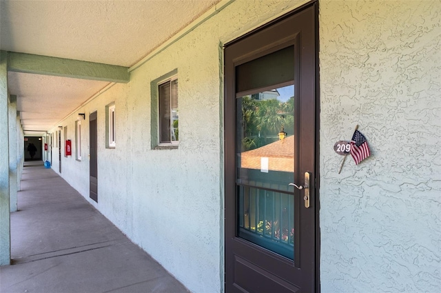 801 83rd Ave N Unit 209, Saint Petersburg, FL 33702 - property entrance featuring stucco siding
