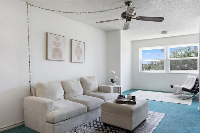 801 83rd Ave N Unit 209, Saint Petersburg, FL 33702 - carpeted living room with a textured ceiling, a ceiling fan, and baseboards