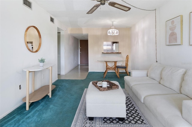 801 83rd Ave N Unit 209, Saint Petersburg, FL 33702 - living area featuring ceiling fan, carpet floors, and baseboards