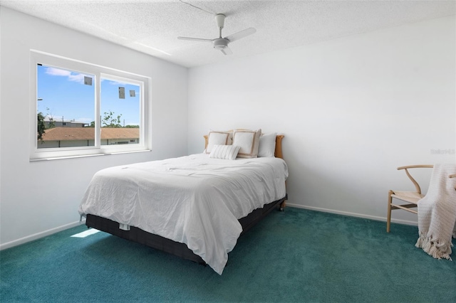 801 83rd Ave N Unit 209, Saint Petersburg, FL 33702 - bedroom featuring carpet floors, baseboards, ceiling fan, and a textured ceiling
