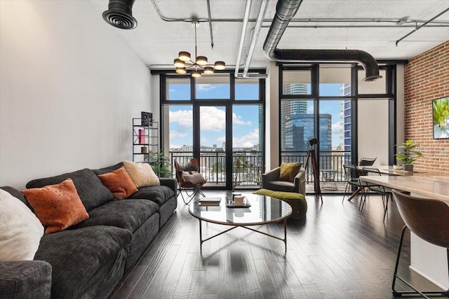 175 S 2nd St S Ph-16, Saint Petersburg, FL 33701 - living room featuring floor to ceiling windows, a chandelier, and hardwood / wood-style flooring