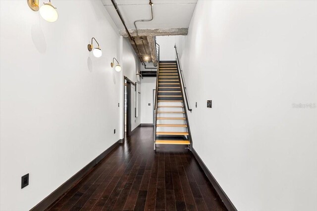 175 S 2nd St S Ph-16, Saint Petersburg, FL 33701 - hall with stairs, wood-type flooring, and baseboards