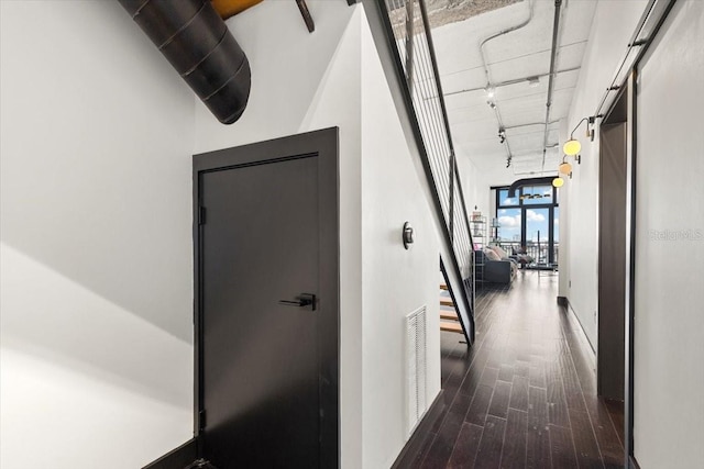175 S 2nd St S Ph-16, Saint Petersburg, FL 33701 - corridor with dark wood-type flooring, track lighting, and stairs