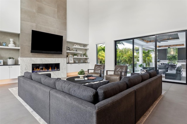 2902 S Beach Dr, Tampa, FL 33629 - living area with a high ceiling and a fireplace