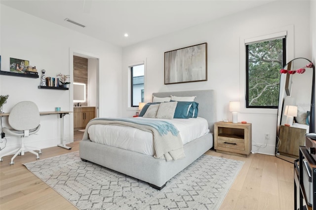 2902 S Beach Dr, Tampa, FL 33629 - bedroom with light wood-style flooring and recessed lighting