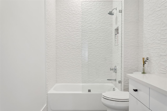 2902 S Beach Dr, Tampa, FL 33629 - bathroom featuring toilet, tub / shower combination, a textured wall, and vanity