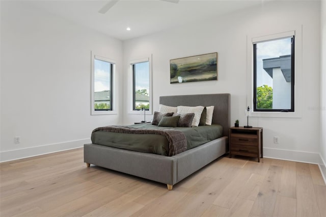 2902 S Beach Dr, Tampa, FL 33629 - bedroom with light wood-style flooring, baseboards, and recessed lighting