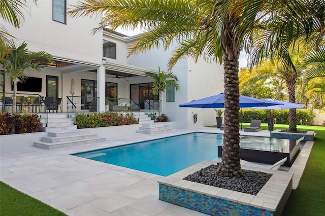 2902 S Beach Dr, Tampa, FL 33629 - swimming pool with ceiling fan, a patio area, and stairs