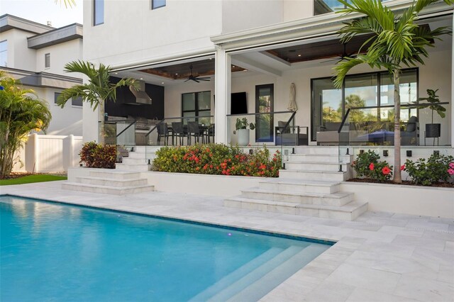 2902 S Beach Dr, Tampa, FL 33629 - outdoor pool featuring ceiling fan, stairs, and fence