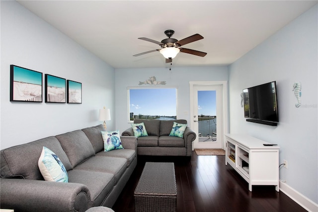 399 2nd St Unit 417, Indian Rocks Beach, FL 33785 - living area featuring ceiling fan, dark wood-style flooring, and baseboards