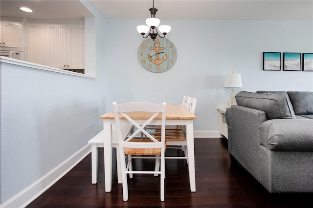 399 2nd St Unit 417, Indian Rocks Beach, FL 33785 - dining area with baseboards, dark wood finished floors, and recessed lighting