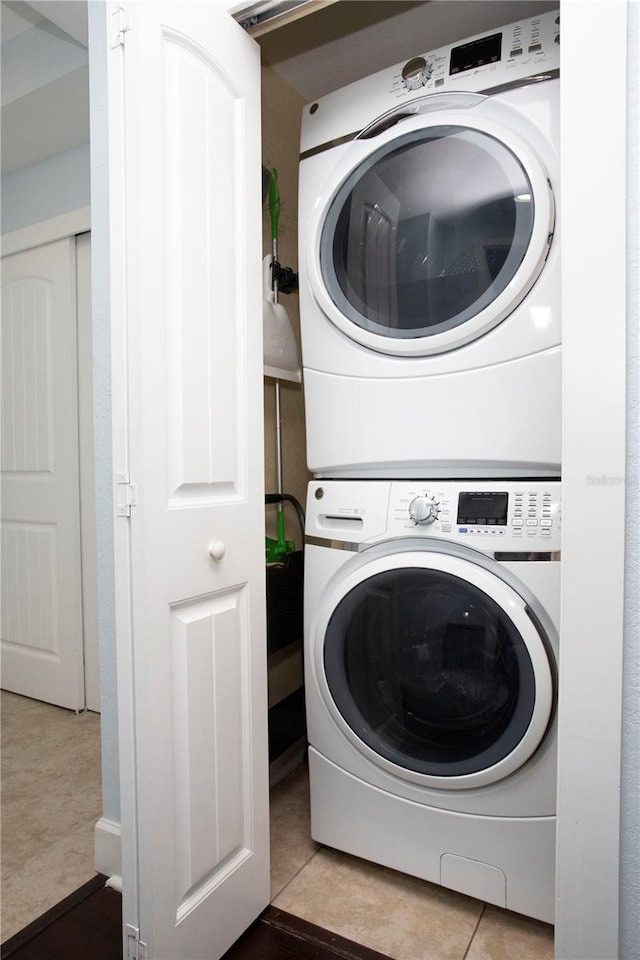 399 2nd St Unit 417, Indian Rocks Beach, FL 33785 - laundry area featuring stacked washer / dryer