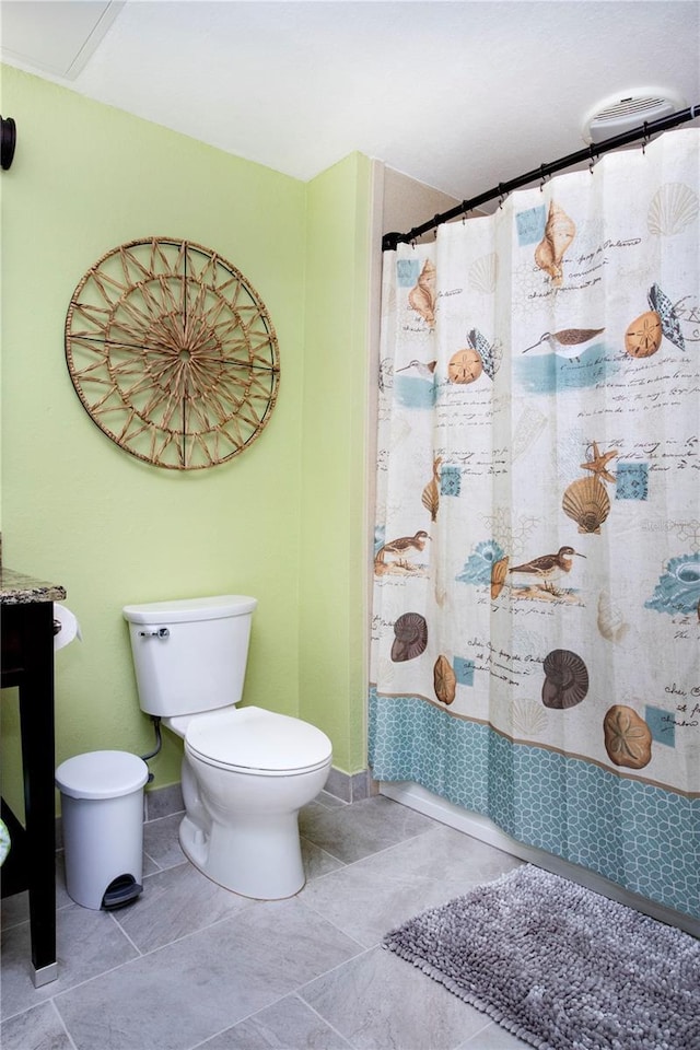 399 2nd St Unit 417, Indian Rocks Beach, FL 33785 - bathroom with toilet and curtained shower