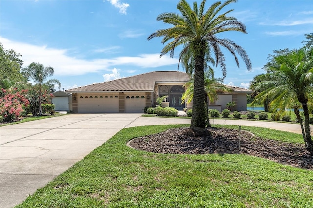 8827 Scout Lake Ct, New Port Richey, FL 34654 - ranch-style home with driveway, a tile roof, an attached garage, stucco siding, and a front lawn