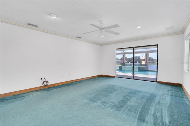 8827 Scout Lake Ct, New Port Richey, FL 34654 - carpeted spare room featuring baseboards, ornamental molding, and ceiling fan