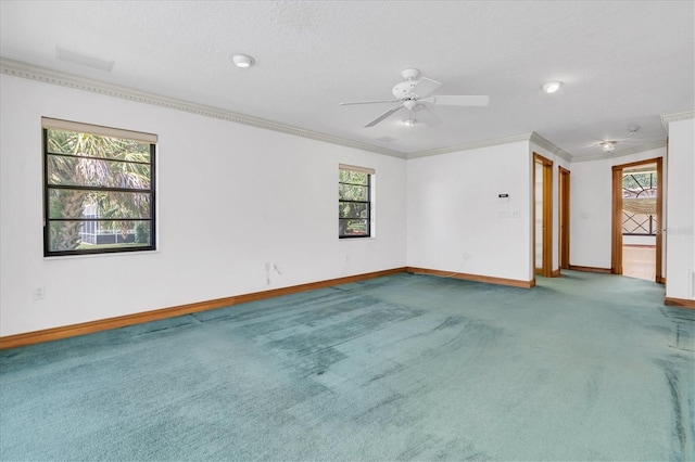8827 Scout Lake Ct, New Port Richey, FL 34654 - carpeted spare room featuring crown molding, baseboards, and a ceiling fan