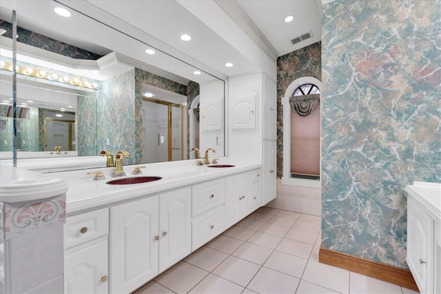 8827 Scout Lake Ct, New Port Richey, FL 34654 - bathroom featuring a stall shower, recessed lighting, tile patterned flooring, double vanity, and wallpapered walls