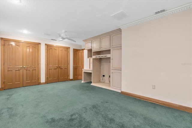 8827 Scout Lake Ct, New Port Richey, FL 34654 - unfurnished bedroom featuring carpet flooring, baseboards, multiple closets, a ceiling fan, and ornamental molding