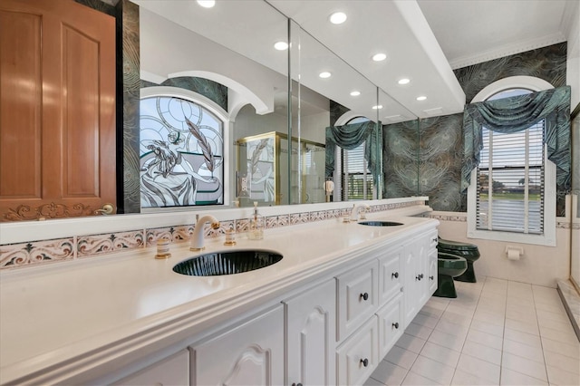 8827 Scout Lake Ct, New Port Richey, FL 34654 - full bath with wallpapered walls, double vanity, a stall shower, tile patterned floors, and ornamental molding