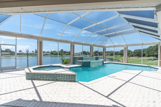 8827 Scout Lake Ct, New Port Richey, FL 34654 - view of pool featuring a pool with connected hot tub, a patio, a lanai, and a water view