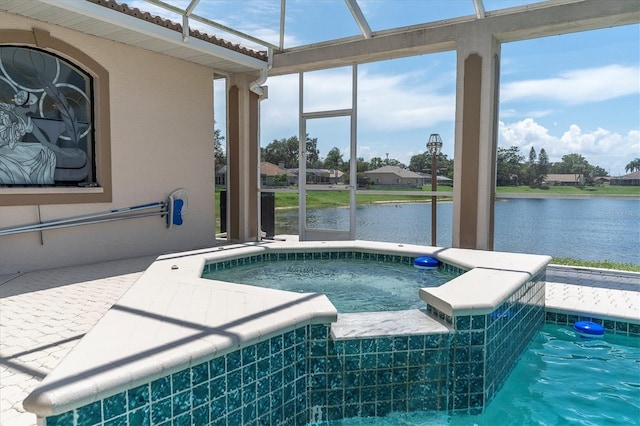 8827 Scout Lake Ct, New Port Richey, FL 34654 - view of pool with a water view, glass enclosure, and a pool with connected hot tub