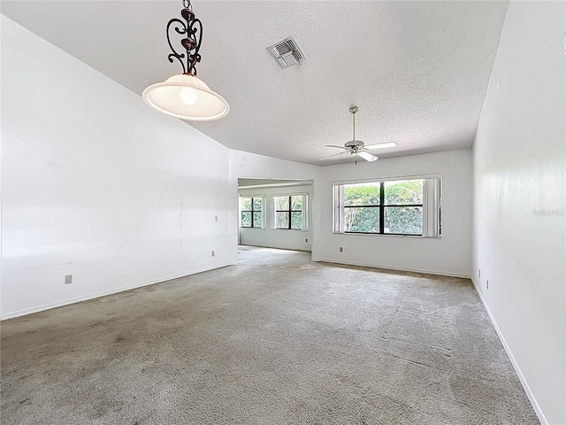 1556 Lynda Ln, Dunedin, FL 34698 - unfurnished room with a ceiling fan, a textured ceiling, carpet, and baseboards