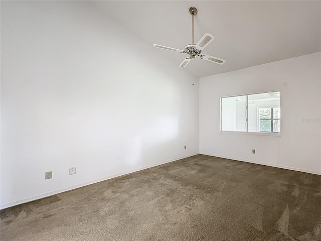 1556 Lynda Ln, Dunedin, FL 34698 - empty room featuring carpet, a ceiling fan, baseboards, and lofted ceiling