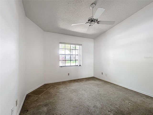1556 Lynda Ln, Dunedin, FL 34698 - carpeted spare room with a textured ceiling, a ceiling fan, and baseboards