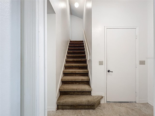 1556 Lynda Ln, Dunedin, FL 34698 - staircase featuring baseboards