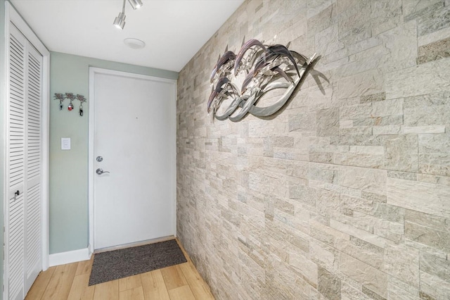 5130 Brittany Dr S Unit 604, Saint Petersburg, FL 33715 - doorway to outside featuring wood finished floors and baseboards