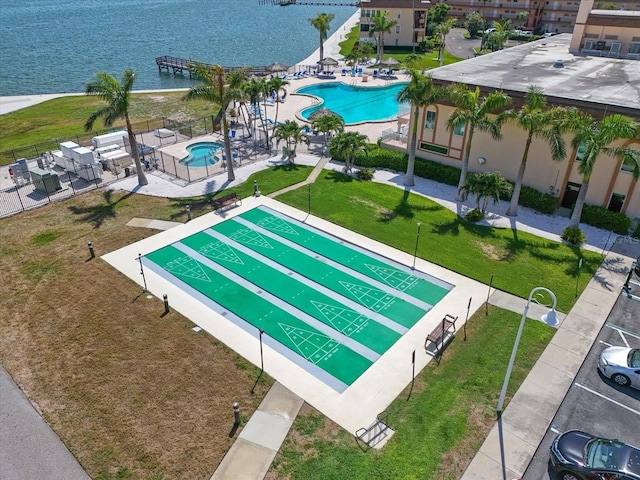 5130 Brittany Dr S Unit 604, Saint Petersburg, FL 33715 - surrounding community with shuffleboard, a lawn, and a water view