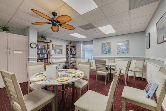 7050 Sunset Dr S Unit 1401, South Pasadena, FL 33707 - carpeted dining room with a drop ceiling and a ceiling fan