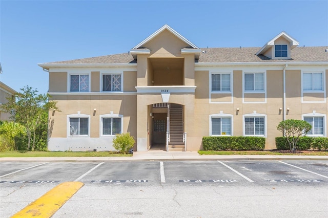 9524 Newdale Way Unit 101, Riverview, FL 33578 - view of property featuring uncovered parking