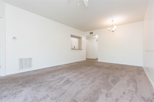 9524 Newdale Way Unit 101, Riverview, FL 33578 - carpeted empty room with ceiling fan, baseboards, and a chandelier