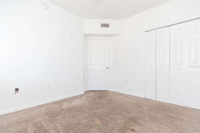 9524 Newdale Way Unit 101, Riverview, FL 33578 - unfurnished bedroom with carpet floors, baseboards, and a closet