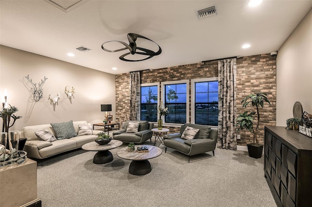 13726 Heartwood Way, Parrish, FL 34219 - carpeted living area featuring brick wall, recessed lighting, and a ceiling fan