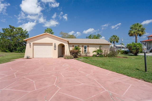 4315 Flexer Dr, Hernando Beach, FL 34607 - ranch-style home with an attached garage, stucco siding, a front lawn, and driveway