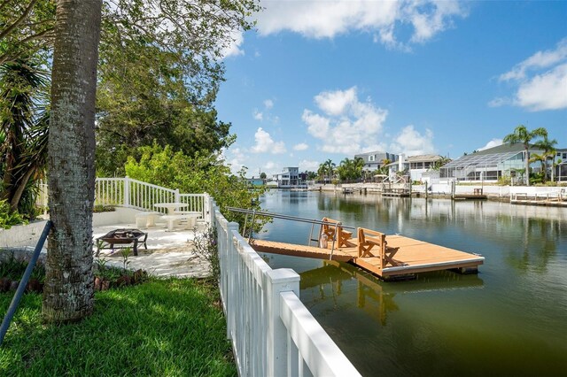 4315 Flexer Dr, Hernando Beach, FL 34607 - dock with a water view, a fire pit, and a residential view
