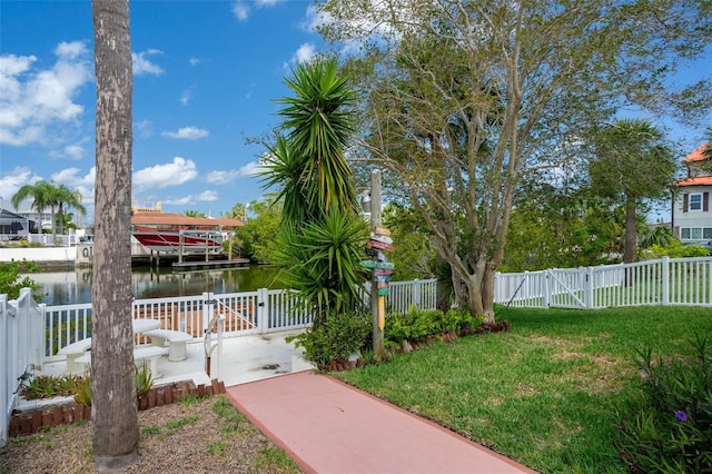 4315 Flexer Dr, Hernando Beach, FL 34607 - view of yard with a gate and a water view