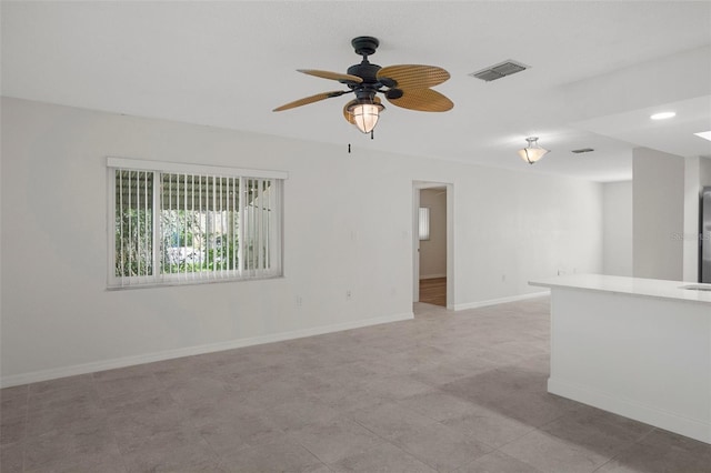 4315 Flexer Dr, Hernando Beach, FL 34607 - unfurnished room featuring a ceiling fan and baseboards