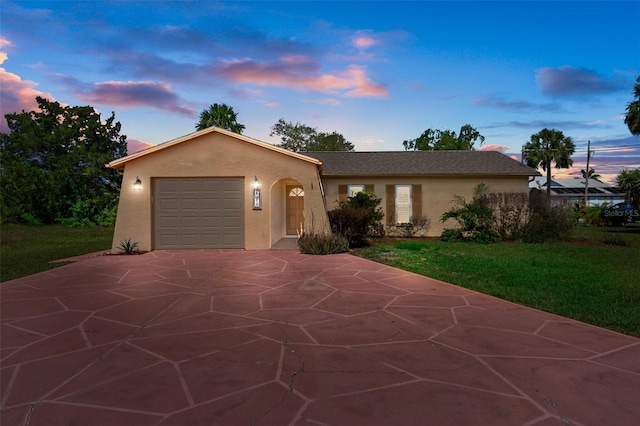 4315 Flexer Dr, Hernando Beach, FL 34607 - ranch-style home featuring stucco siding, an attached garage, a yard, and concrete driveway
