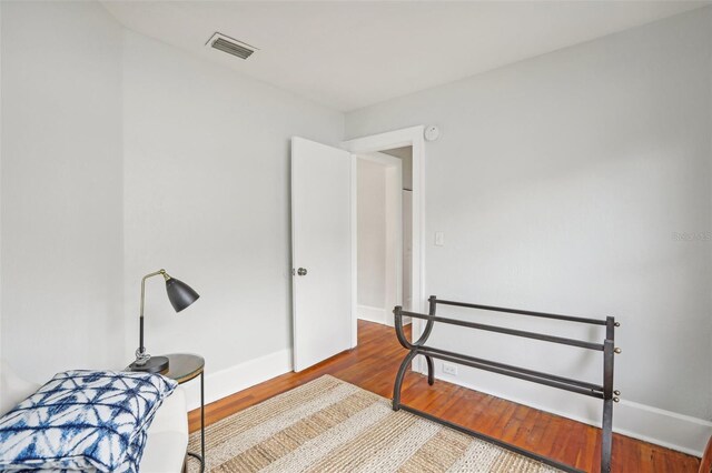 2015 3rd St S, Saint Petersburg, FL 33705 - bedroom with wood finished floors and baseboards