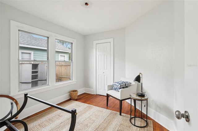 2015 3rd St S, Saint Petersburg, FL 33705 - bedroom with a closet, baseboards, and wood finished floors