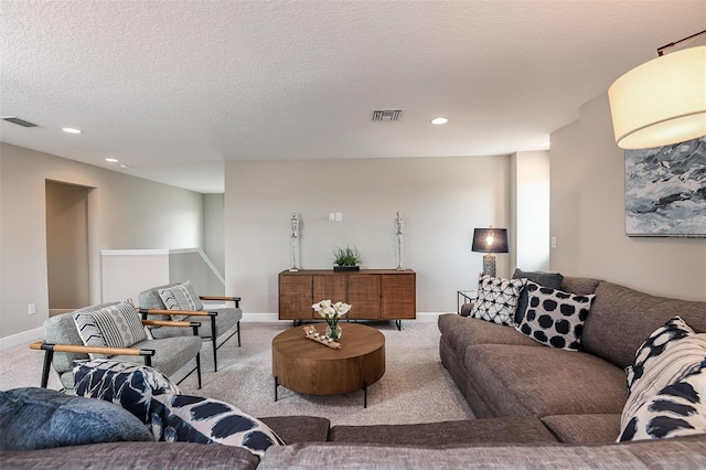 13722 Heartwood Way, Parrish, FL 34219 - carpeted living area with recessed lighting, baseboards, and a textured ceiling