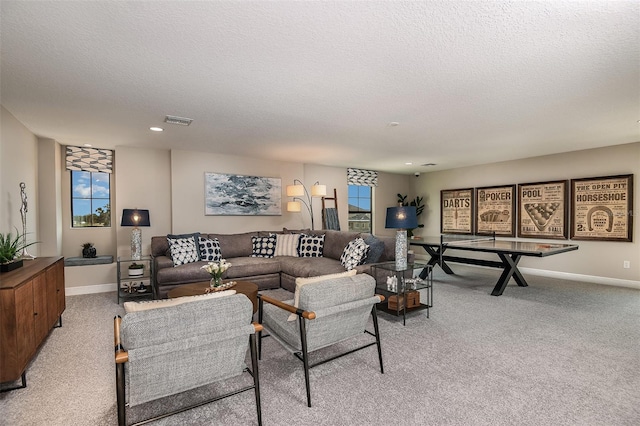 13722 Heartwood Way, Parrish, FL 34219 - carpeted living room with a textured ceiling, baseboards, and recessed lighting