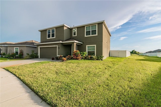 traditional-style house featuring stucco siding, concrete driveway, and an attached garage